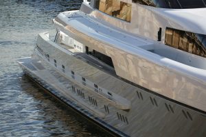 Giving new life to a yacht through a rejuvenation of aged topcoat.
